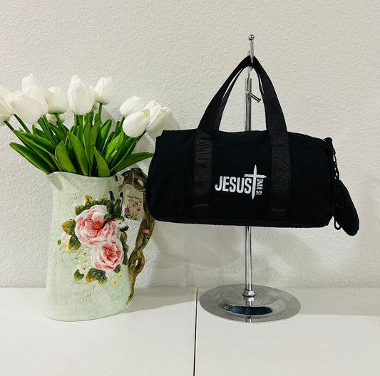 Black mini-Jesus duffle bag with crossbody strap and coin purse