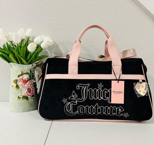 Black and Pink Juicy Couture Weekender bag with heart charm and crossbody strap